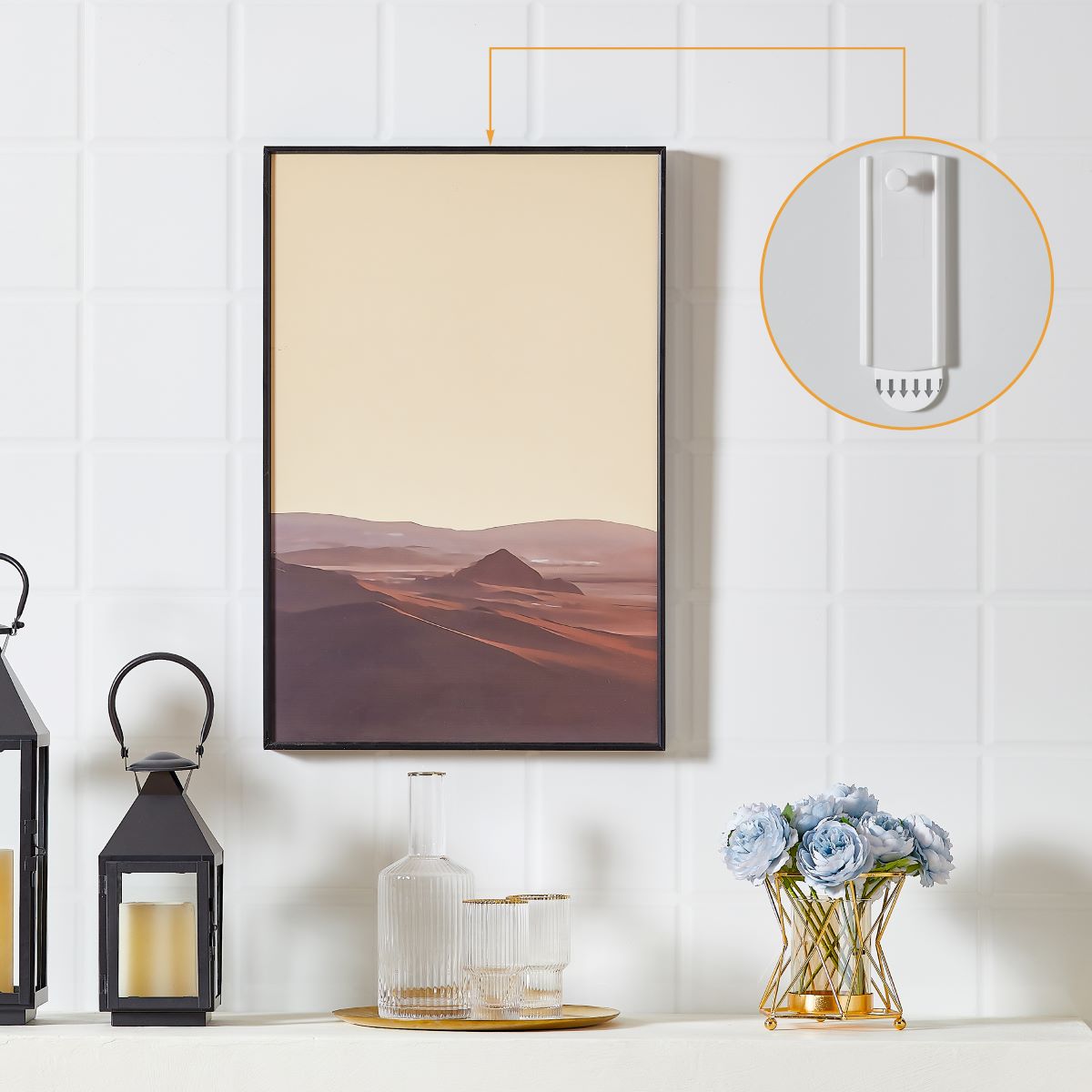 In a stylish atmosphere, a picture is hung on the wall using a JELLYSUB picture hanger.