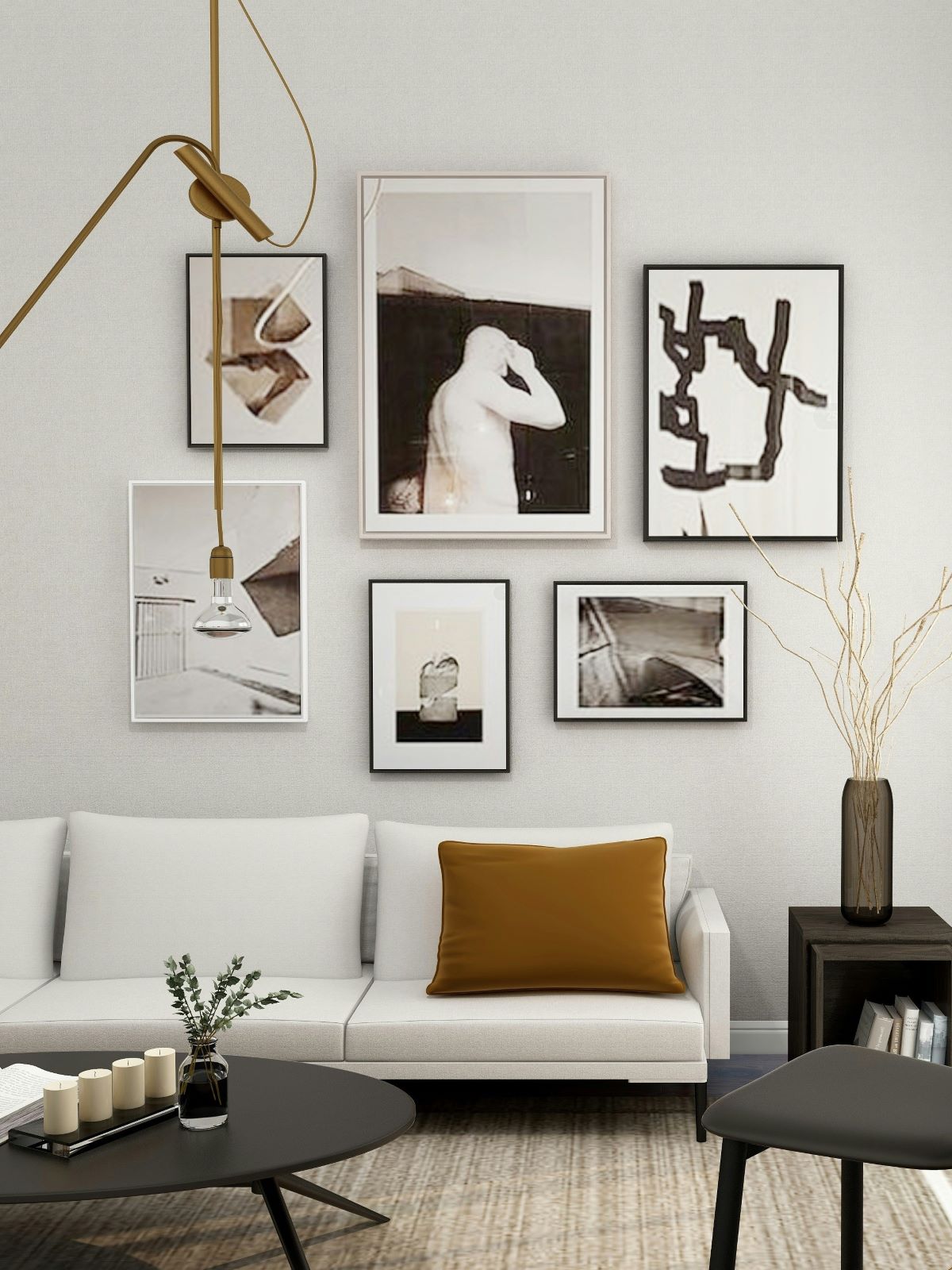 A corner of the modern style living room with a set of decorative paintings of different sizes hanging on the wall